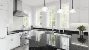 "Modern white kitchen with black granite countertops, shaker cabinets, stainless steel appliances, and a central island under natural light"